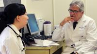 Columbia Neurology fellow in a meeting